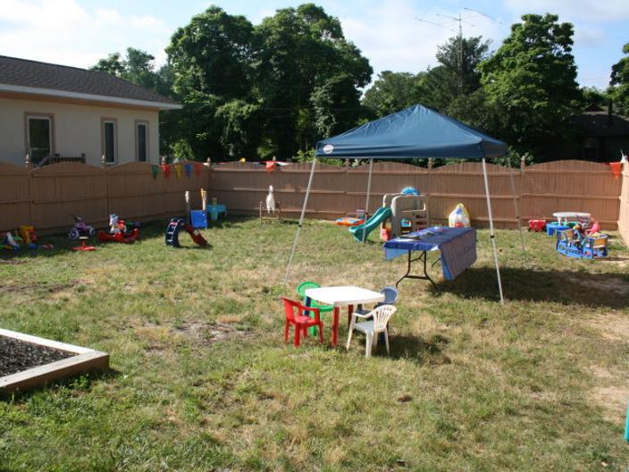 Our fenced in playground promotes large motor skills & development and outdoor investigation.